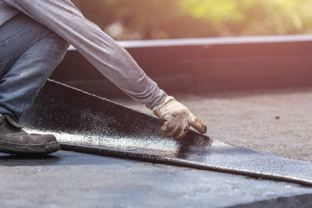 Professional Basement Waterproofing technician working in Remington, VA